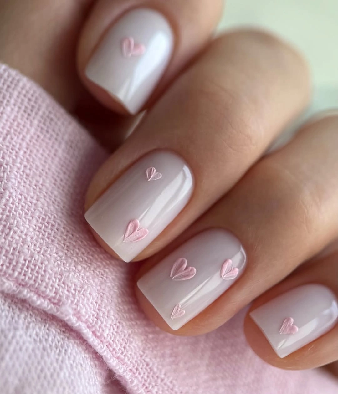 chic nude fall nails 2026 Milky White Nails With Pink Hearts