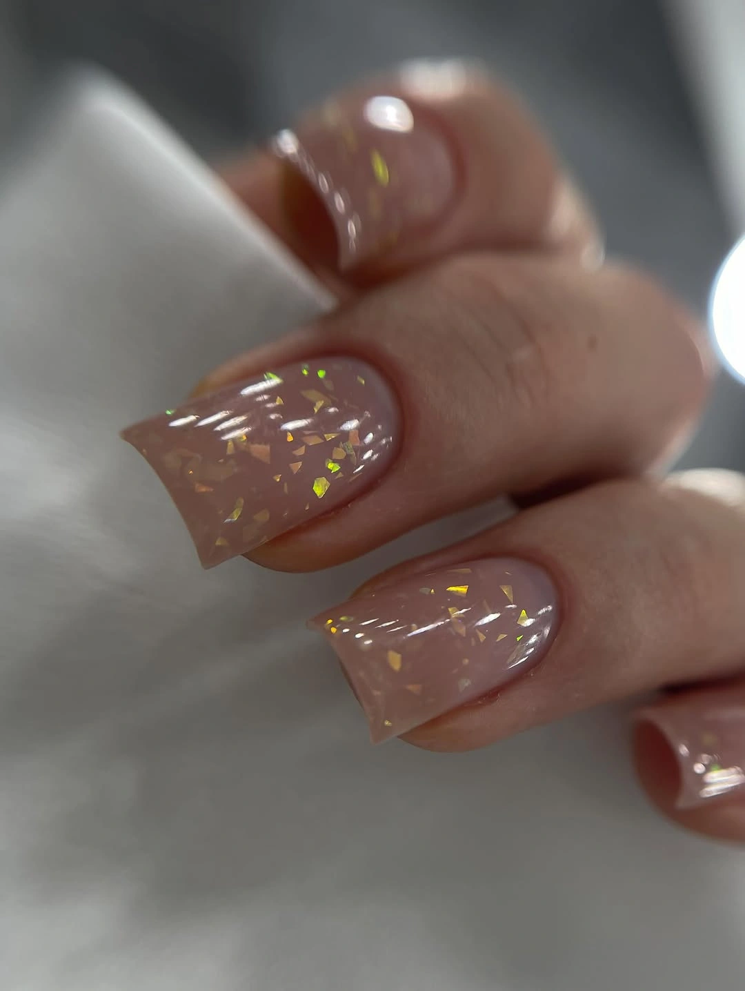 chic nude fall nails 2026 Long Nude Stiletto Nails With Gold Flakes