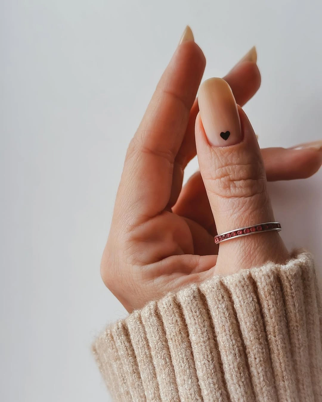 chic nude fall nails 2026 Minimal Nude Almond With A Tiny Heart