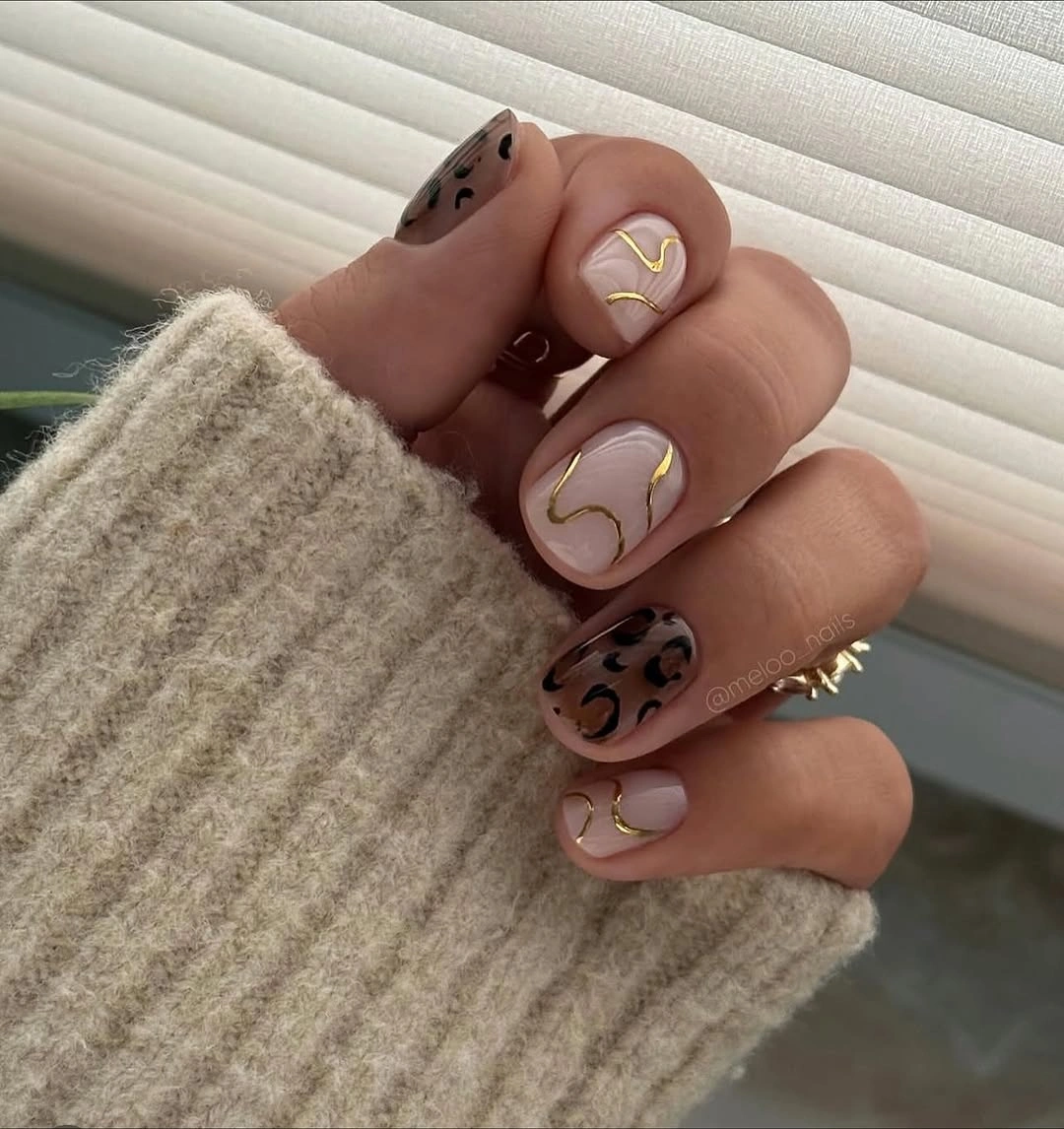 chic nude fall nails 2026 Blush Nude With Gold And Black Art