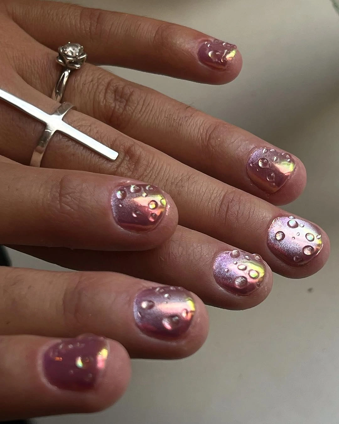 chic nude fall nails 2026 Iridescent Pink Chrome With Tiny Gems