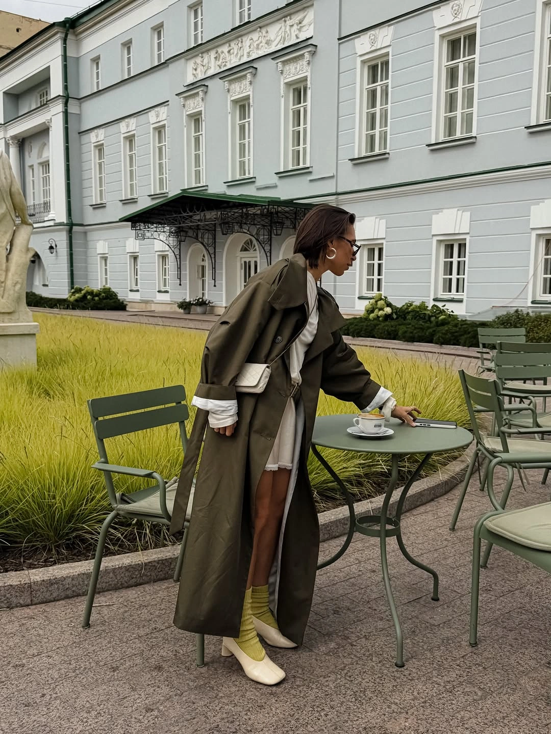 chic october fashion trends 2026 Olive Trench With Soft Ivory Layers