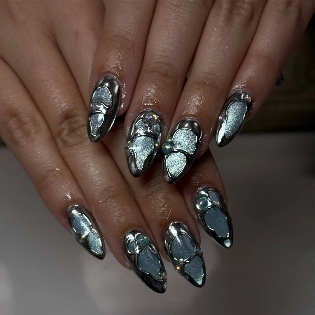 chic october nails design 2026 Silver Sculptural Nails With Dimensional Details