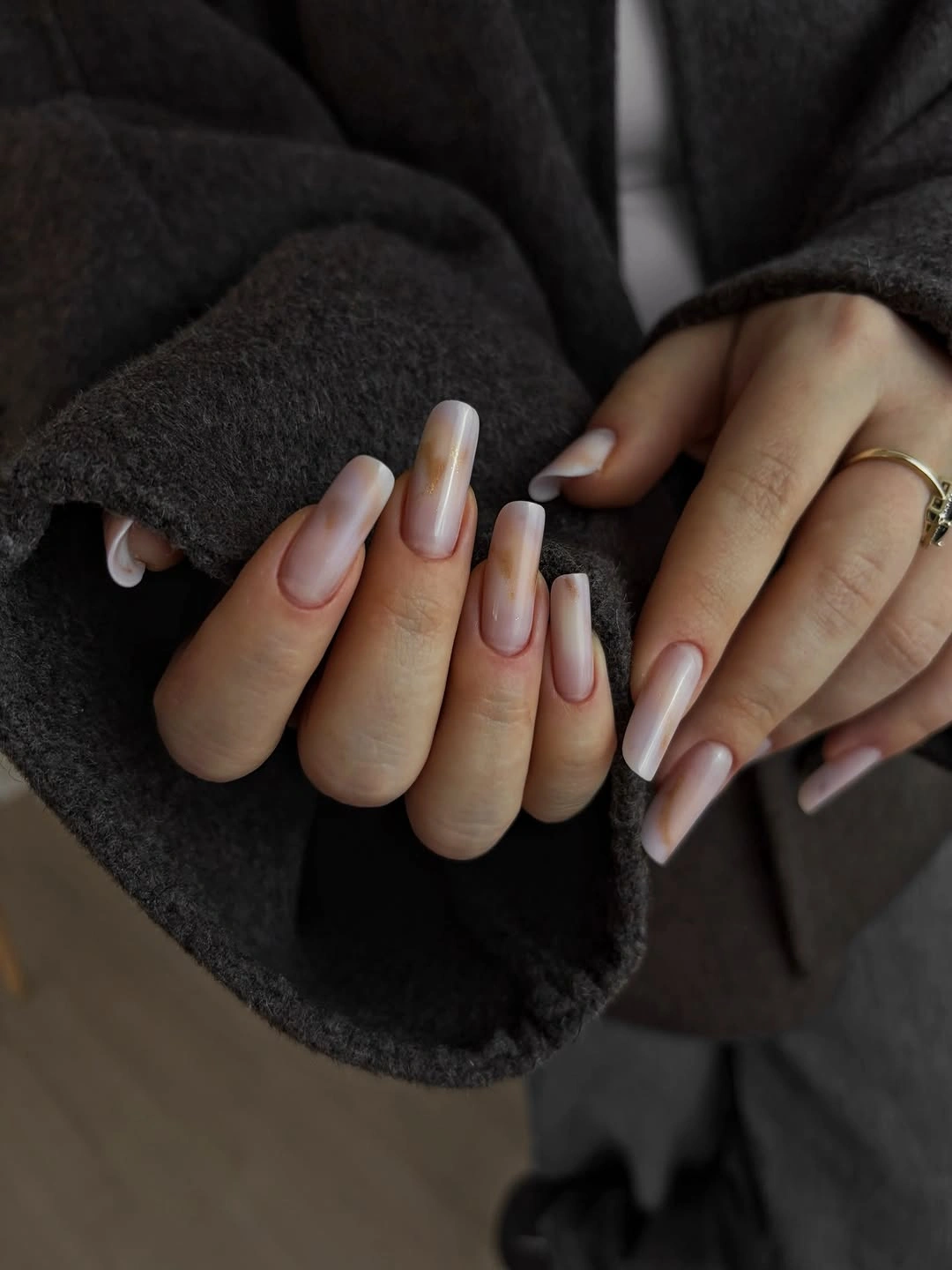 chic october nails design 2026 Sheer Pink Almond Nails With a Soft Glossy Finish