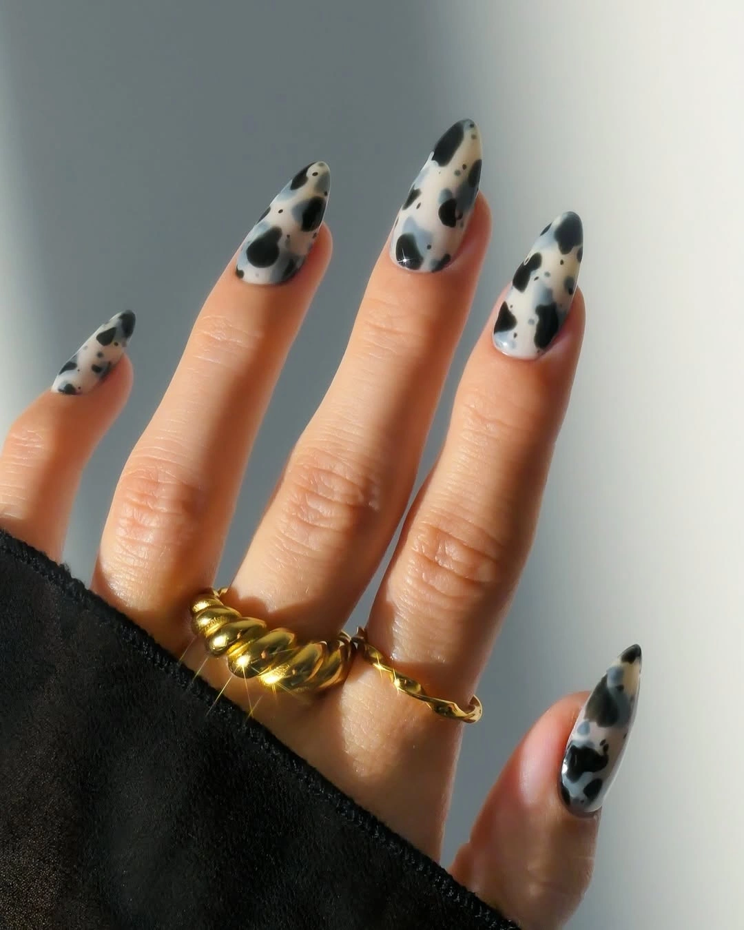 creative fall manicure ideas 2026 Playful Cow Print With A Modern Twist