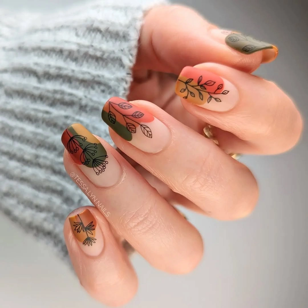creative fall manicure ideas 2026 Minimal Botanical Art In Earthy Tones