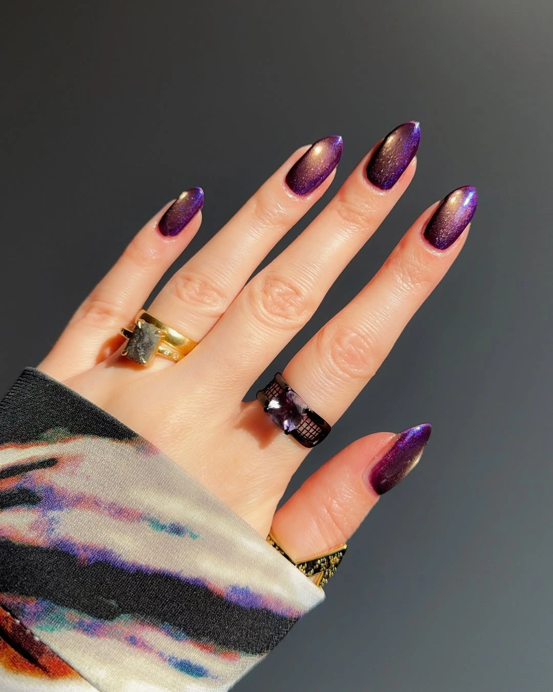 creative fall nail art ideas 2026 plum purple cat eye almond nails