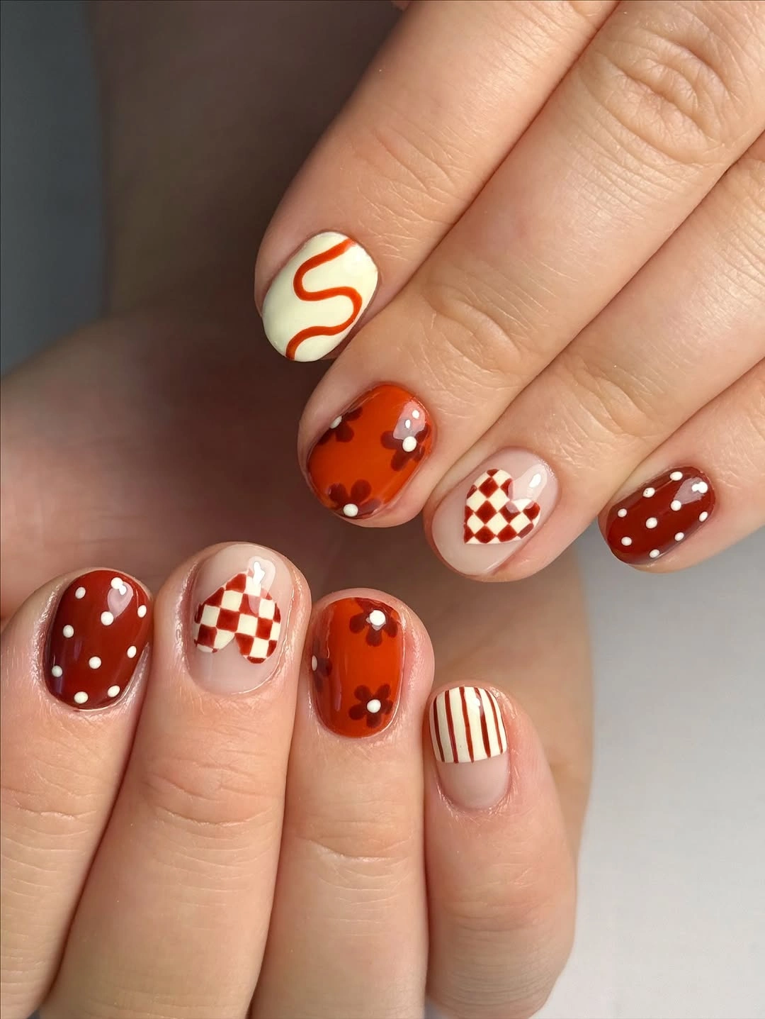 creative fall nail art ideas 2026 red short nails checkerboard dots