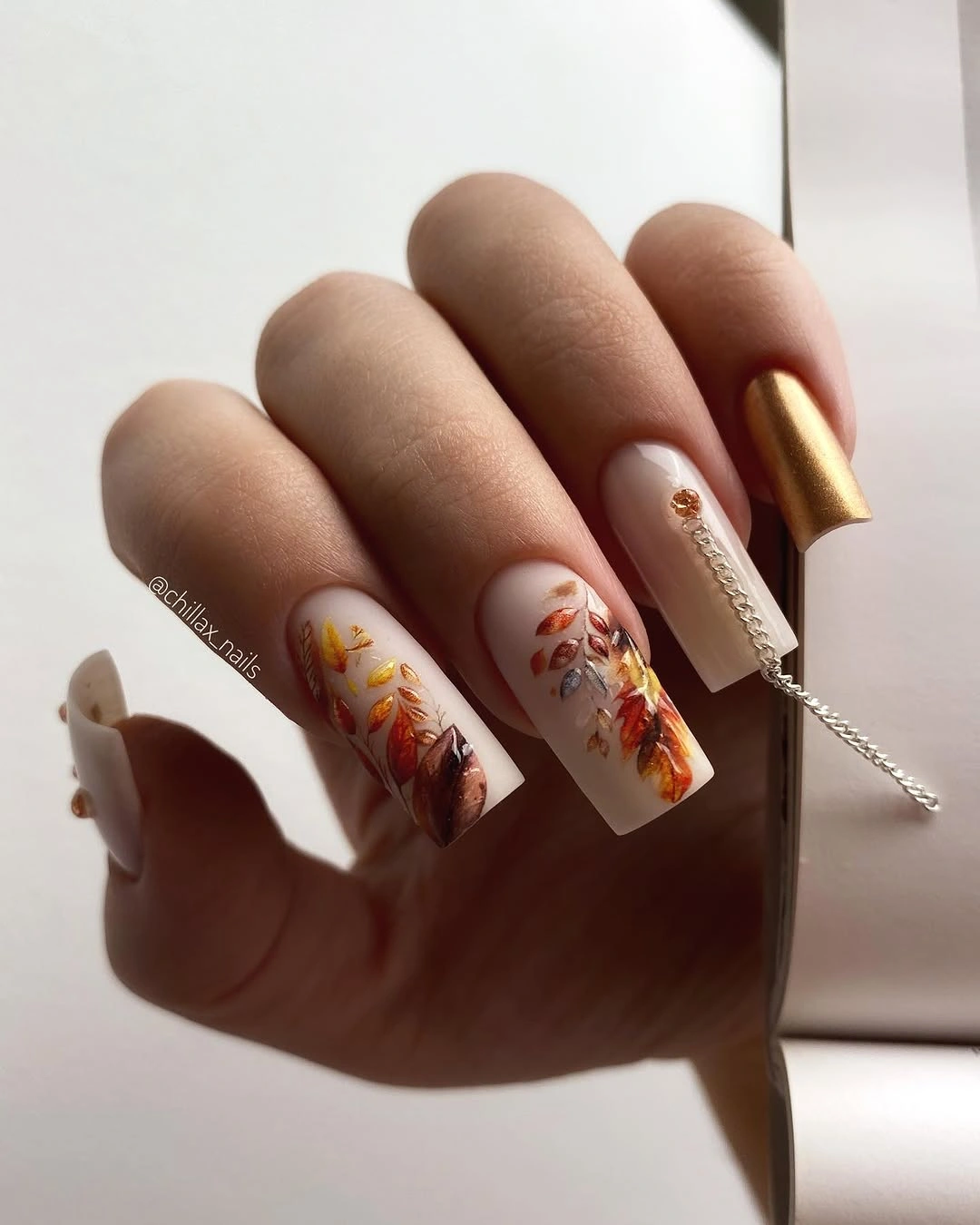 creative fall nail inspiration 2026 Soft Autumn Leaves On Milky White