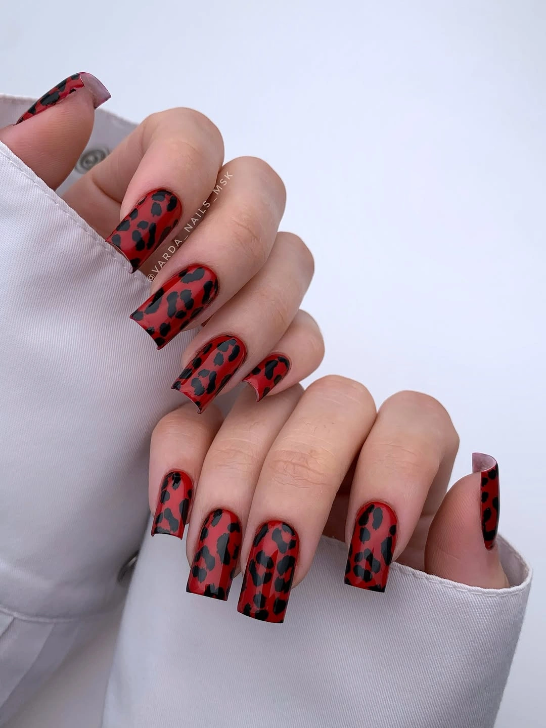 creative fall nail inspiration 2026 Bold Crimson Leopard Nails That Make Acrylic Sets Feel Fierce