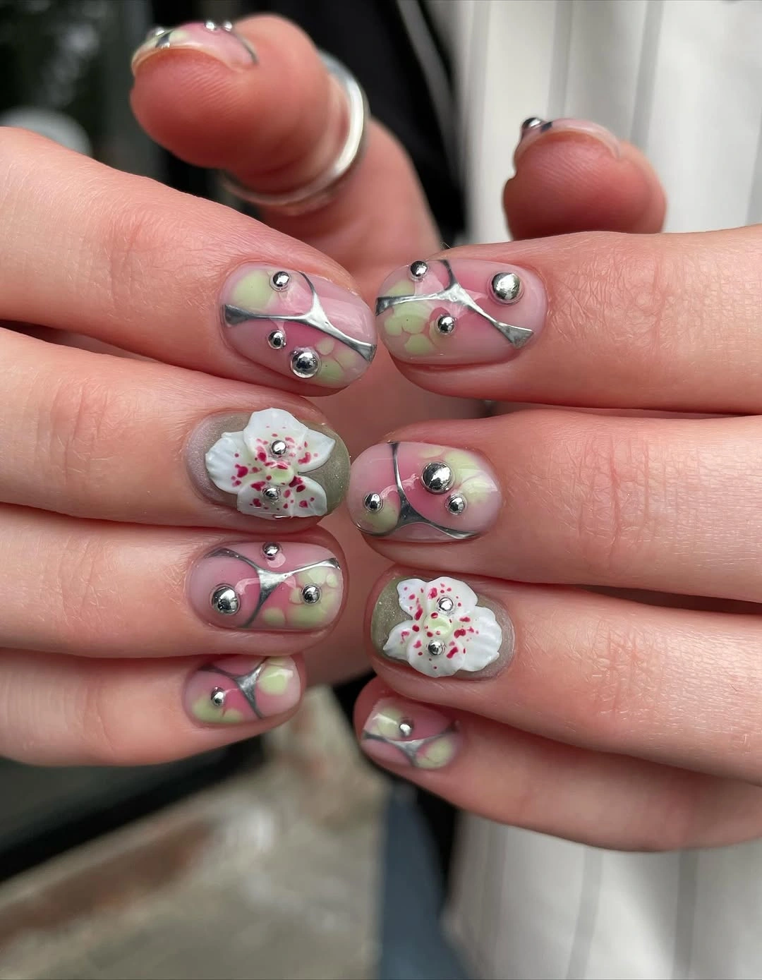creative fall nail inspiration 2026 Modern Floral Chrome Nails With Artistic Autumn Details