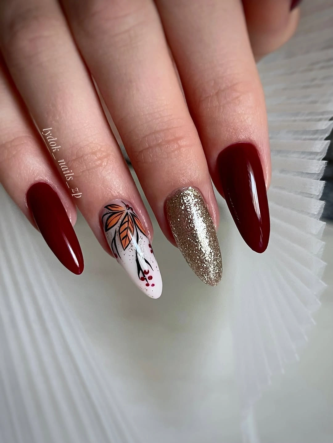 creative fall nail inspiration 2026 Classic Burgundy With a Golden Autumn Accent