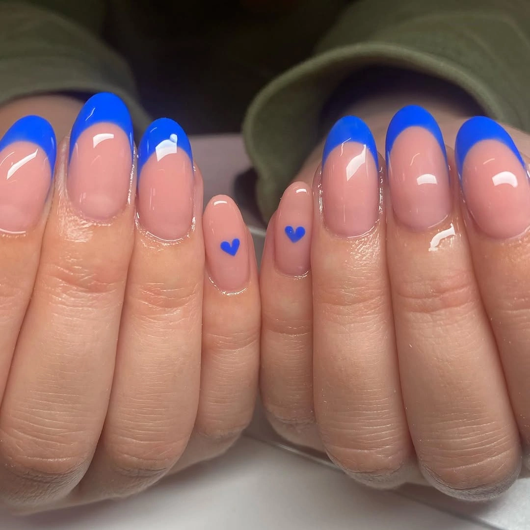 creative fall nails with accent nail Blue French Tips With Tiny Heart Accents