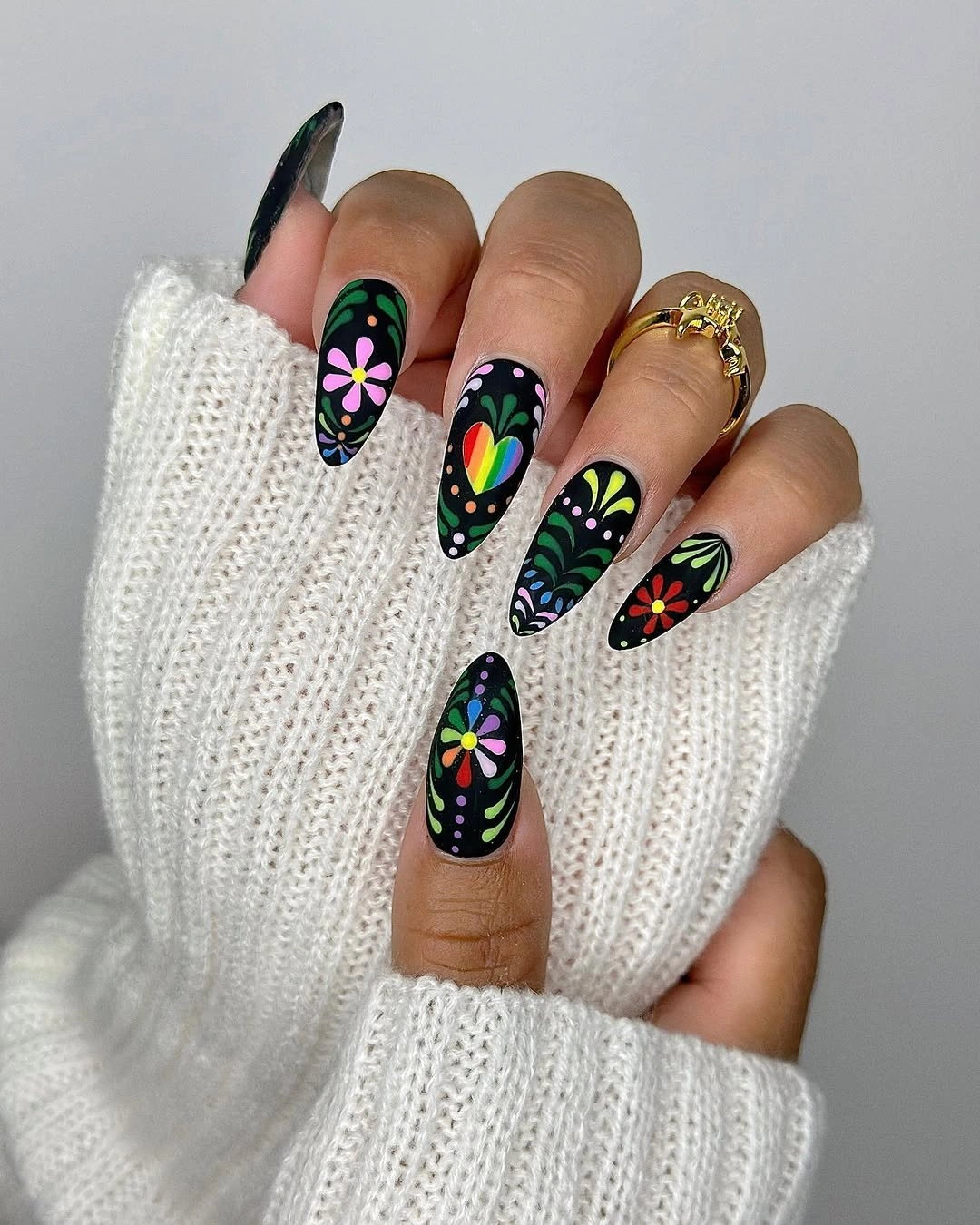 creative fall nails with accent nail Black Floral Nails With Colorful Accent Details