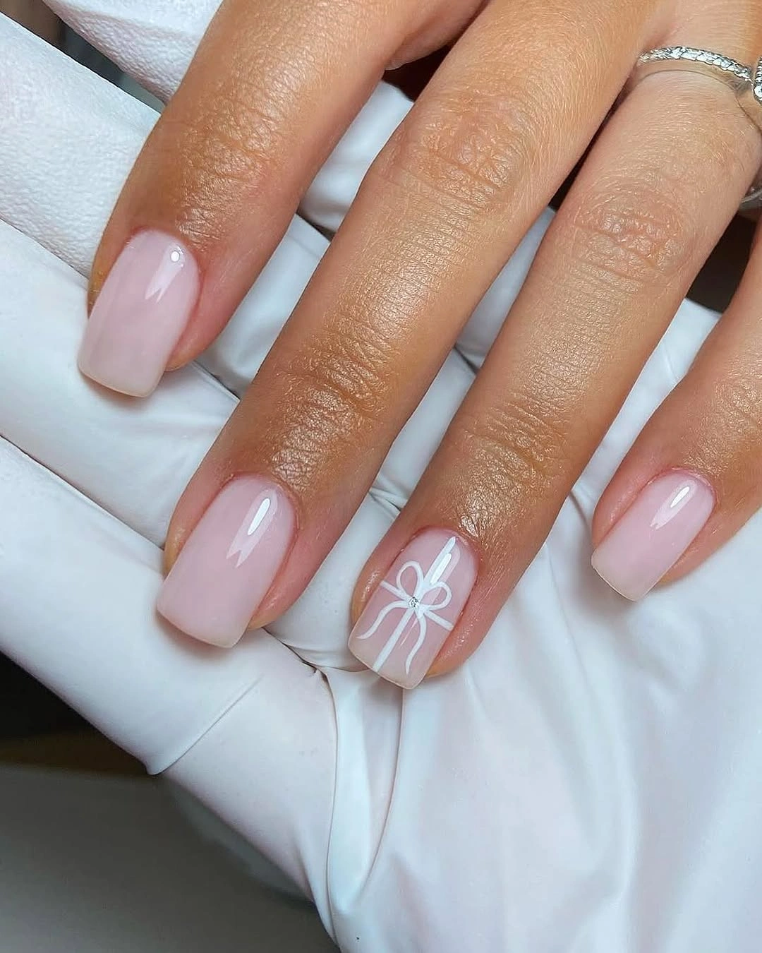 creative fall nails with accent nail Blush Pink Nails With a Delicate Bow Accent