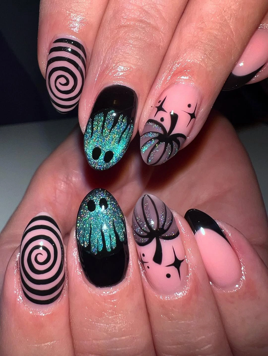 creative fall nails with pumpkins 2026 Hypnotic Teal Pumpkin Nails