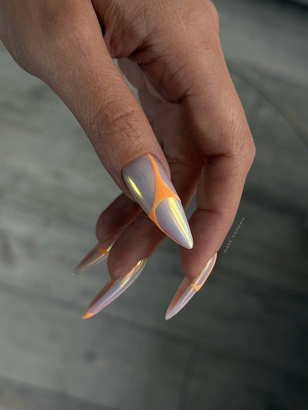 cute early fall nails 2026 Iridescent Almond Nails With A Tangerine Accent