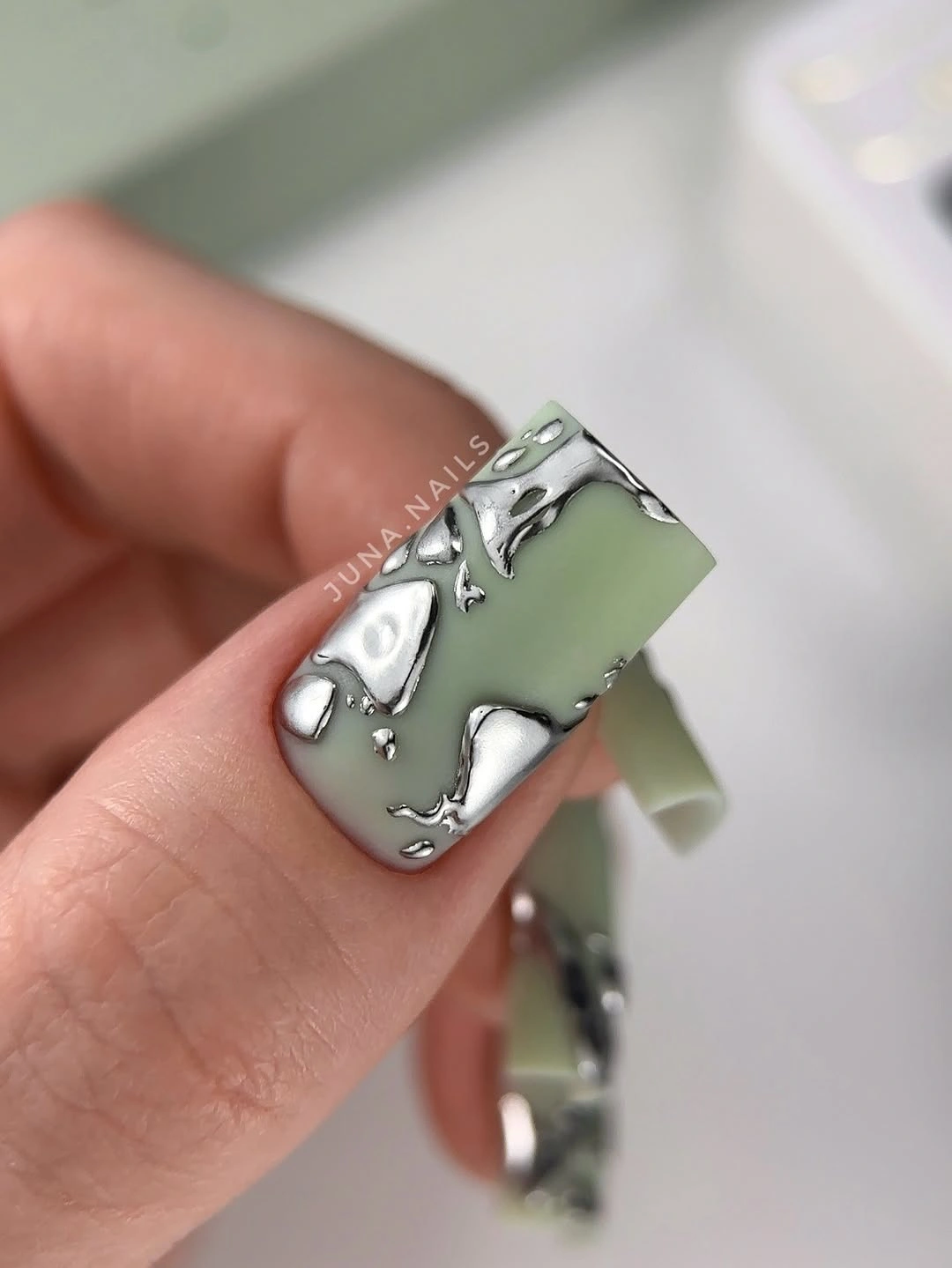 cute early fall nails 2026 Muted Green With Sculpted Silver Nail Art