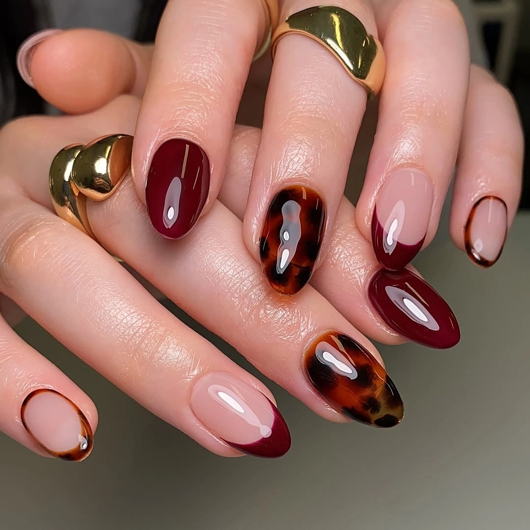 cute fall short almond nails 2026 Burgundy and Tortoiseshell French for Classic Fall Glamour