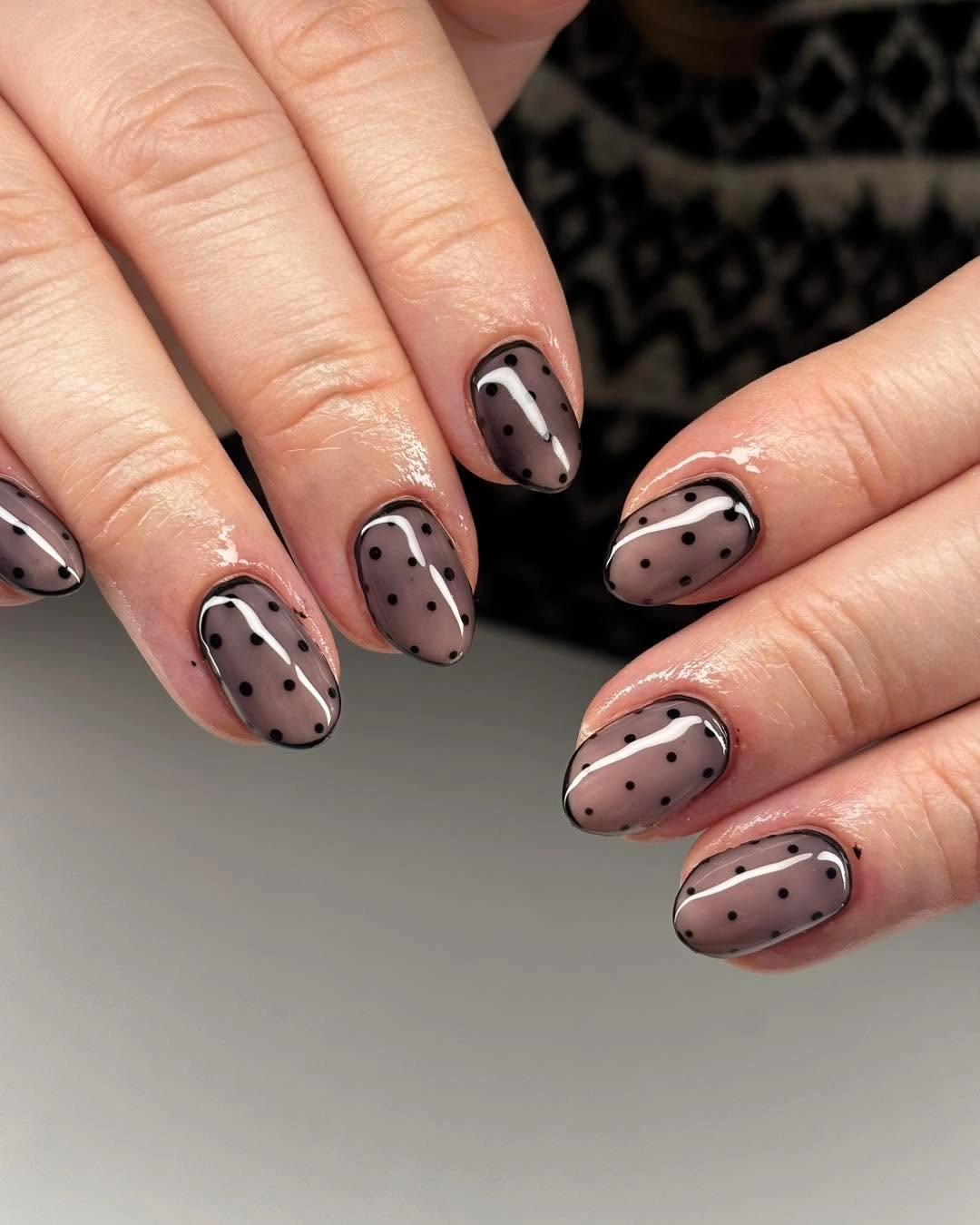 cute fall short almond nails 2026 Sheer Black Polka Dot Nails