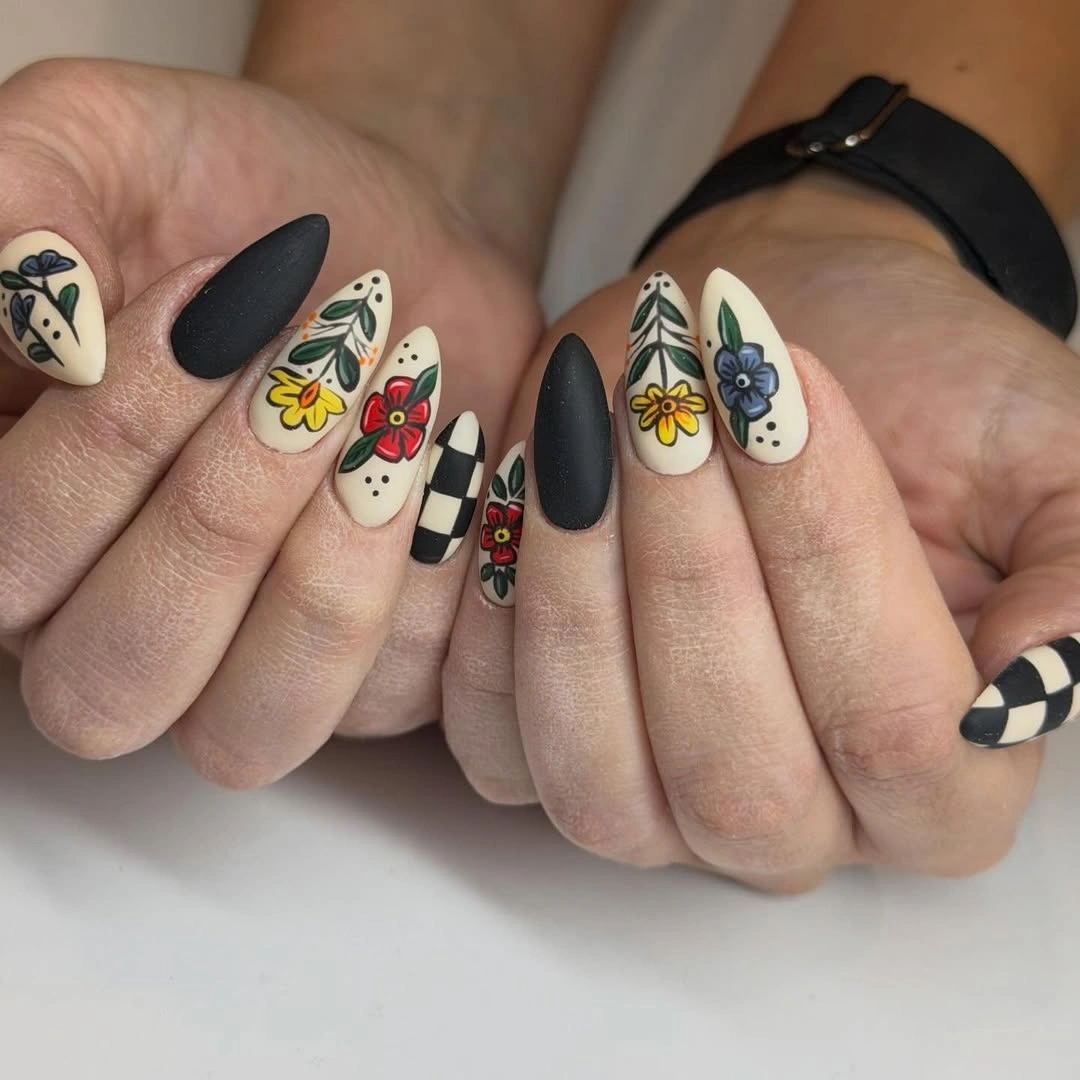 cute halloween nails designs 2026 Moody Folk Florals in Black and Cream