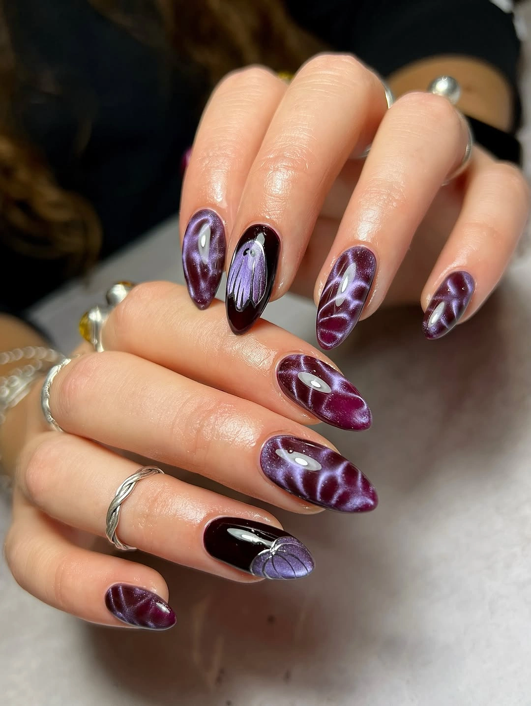 cute halloween nails designs 2026 purple cat eye Halloween manicure