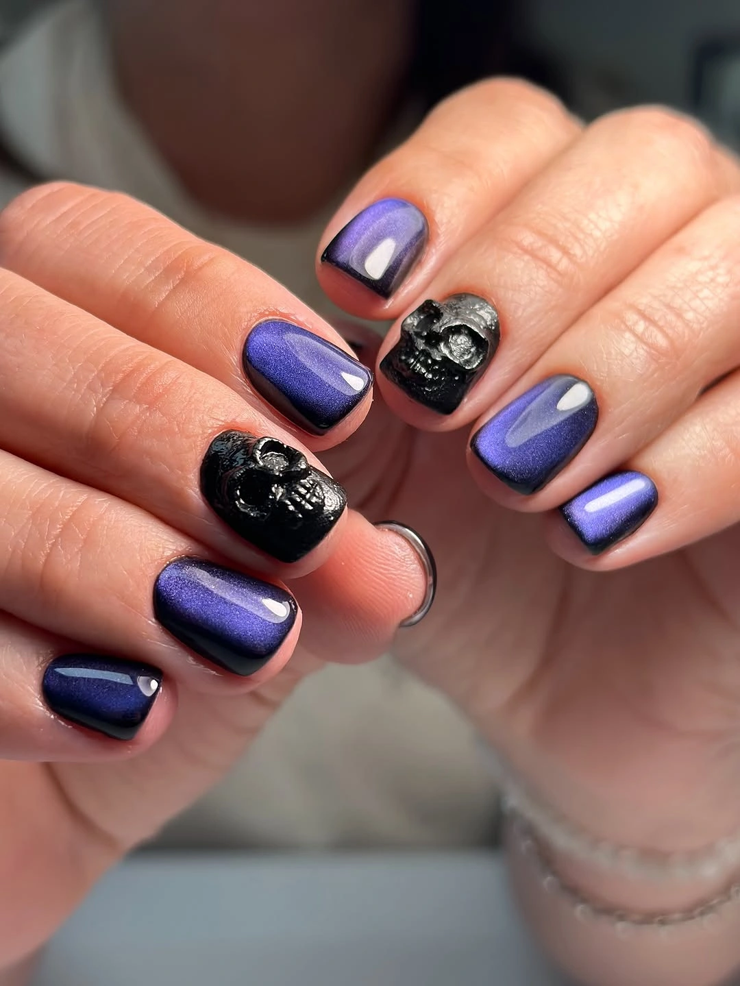 cute halloween nails designs 2026 purple cat eye nails with gothic black details