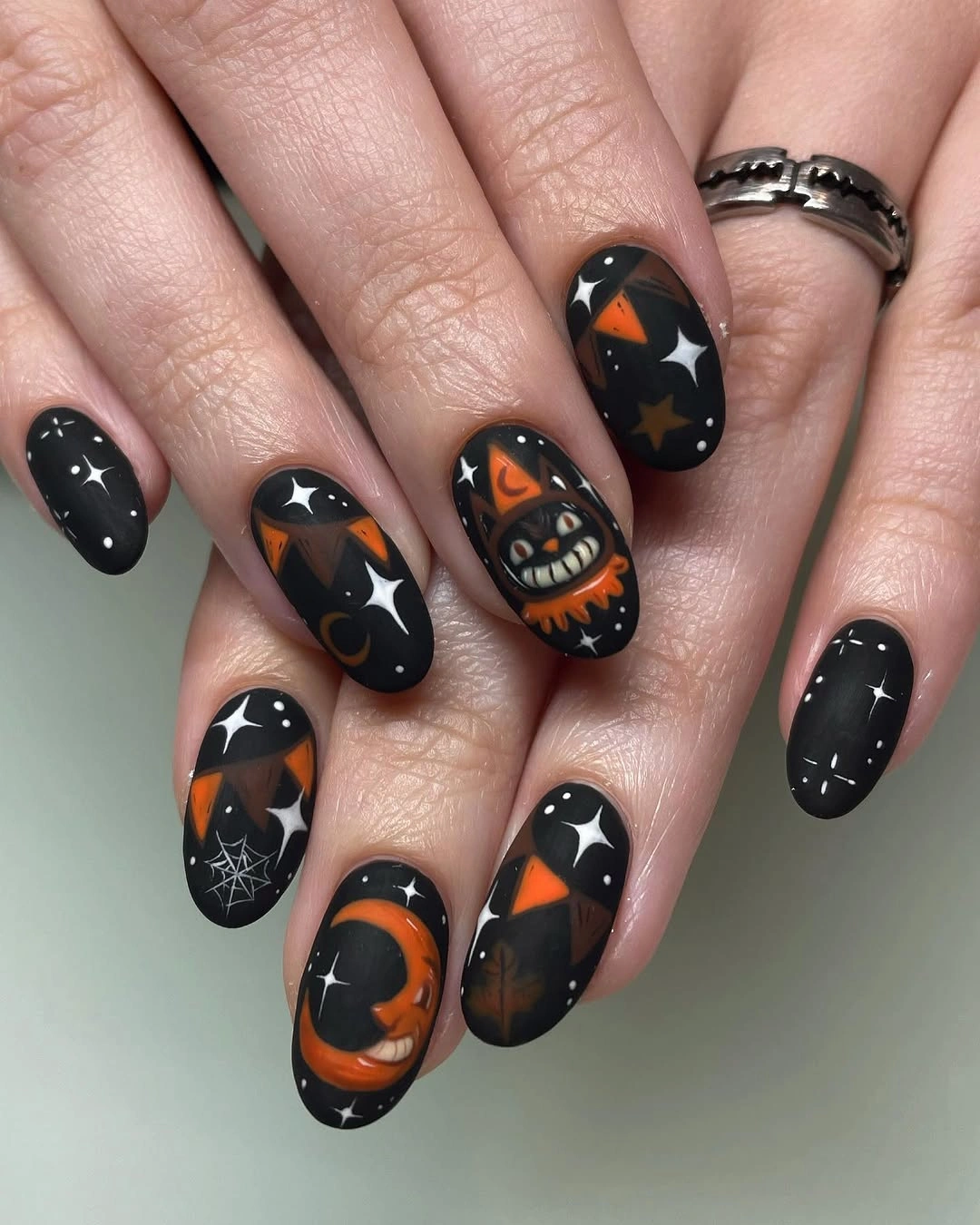 cute halloween nails designs 2026 Midnight Orange Celestial Nails