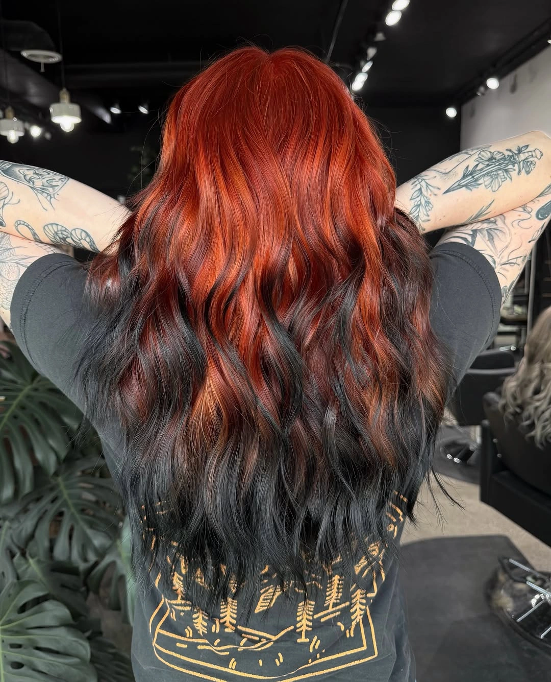 dyed hair ideas Split Color With Fiery Copper and Black