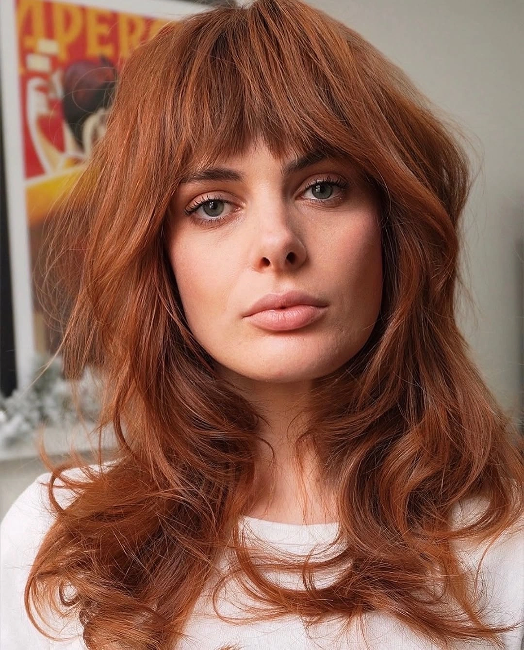 dyed hair ideas Soft Auburn Layers With Full Bangs