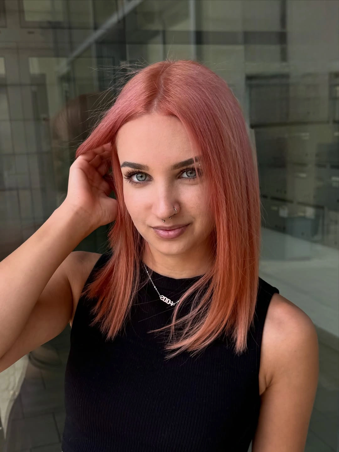 dyed hair ideas Pastel Peach Hair With a Fresh Modern Shape