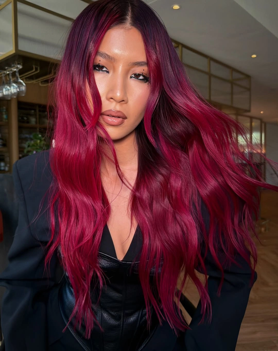 dyed hair ideas Vivid Berry Waves With a Glamorous Finish