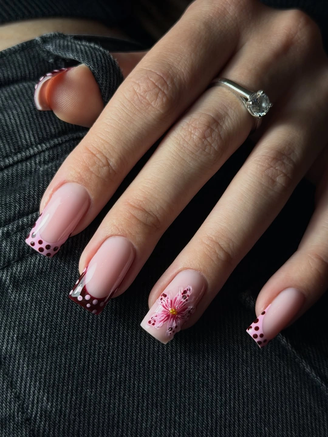 flattering fall nails for olive skin tone 2026 Burgundy Dots and Floral Tips