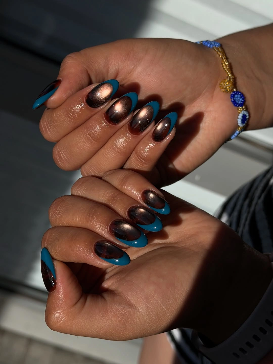 gorgeous fall dark nail shadow ideas 2026 Teal French With Bronze Shadow