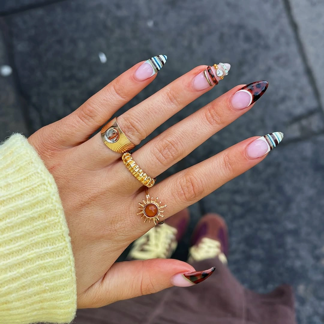 gorgeous fall trendy nails 2026 Chocolate Tortoiseshell Tips With a Playful Mixed-Manicure Twist