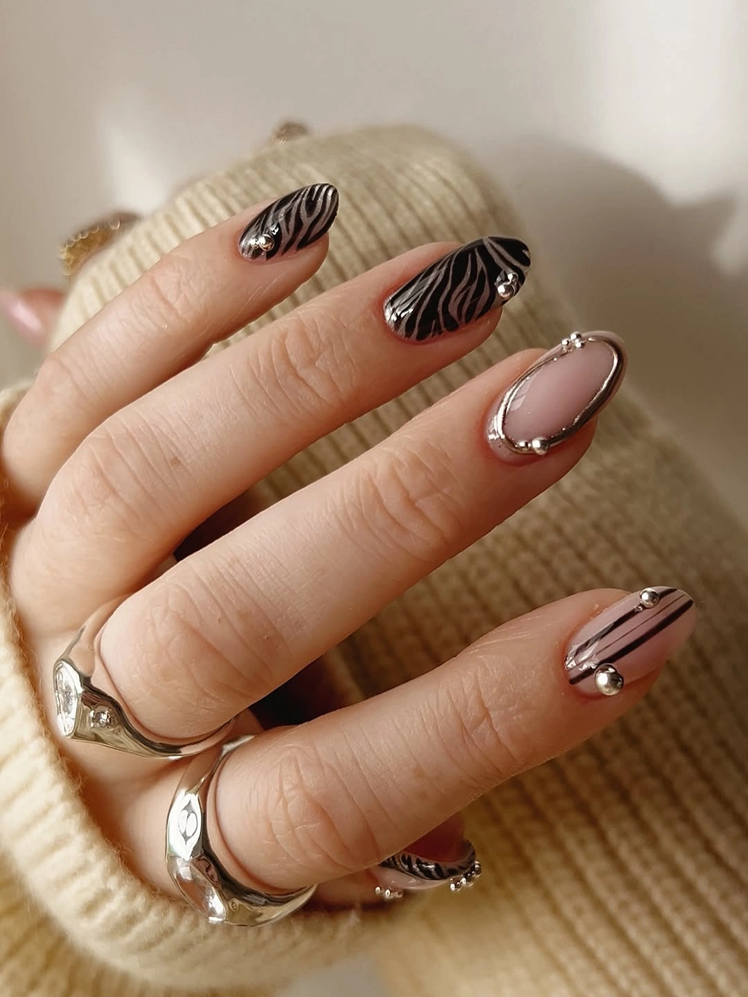 gorgeous fall trendy nails 2026 Black Zebra Chrome With Silver Accents