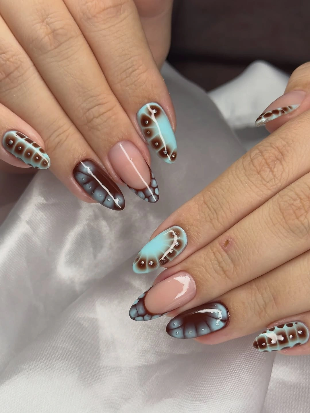 gorgeous october nail colours 2026 Mocha Blue Nails With Retro Detailing