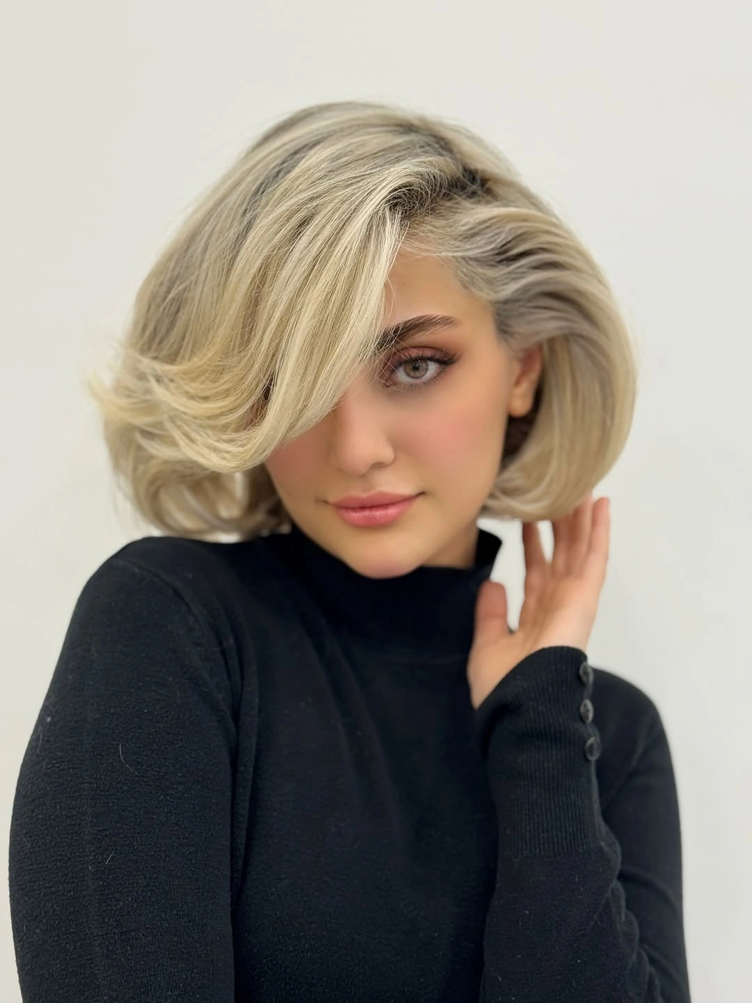 layered bob hair Soft Blonde layers with a glamorous sweep