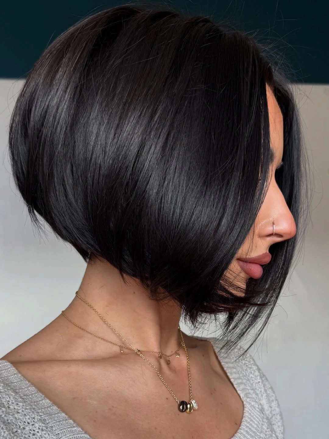 layered bob hair glossy Black bob with face framing layers