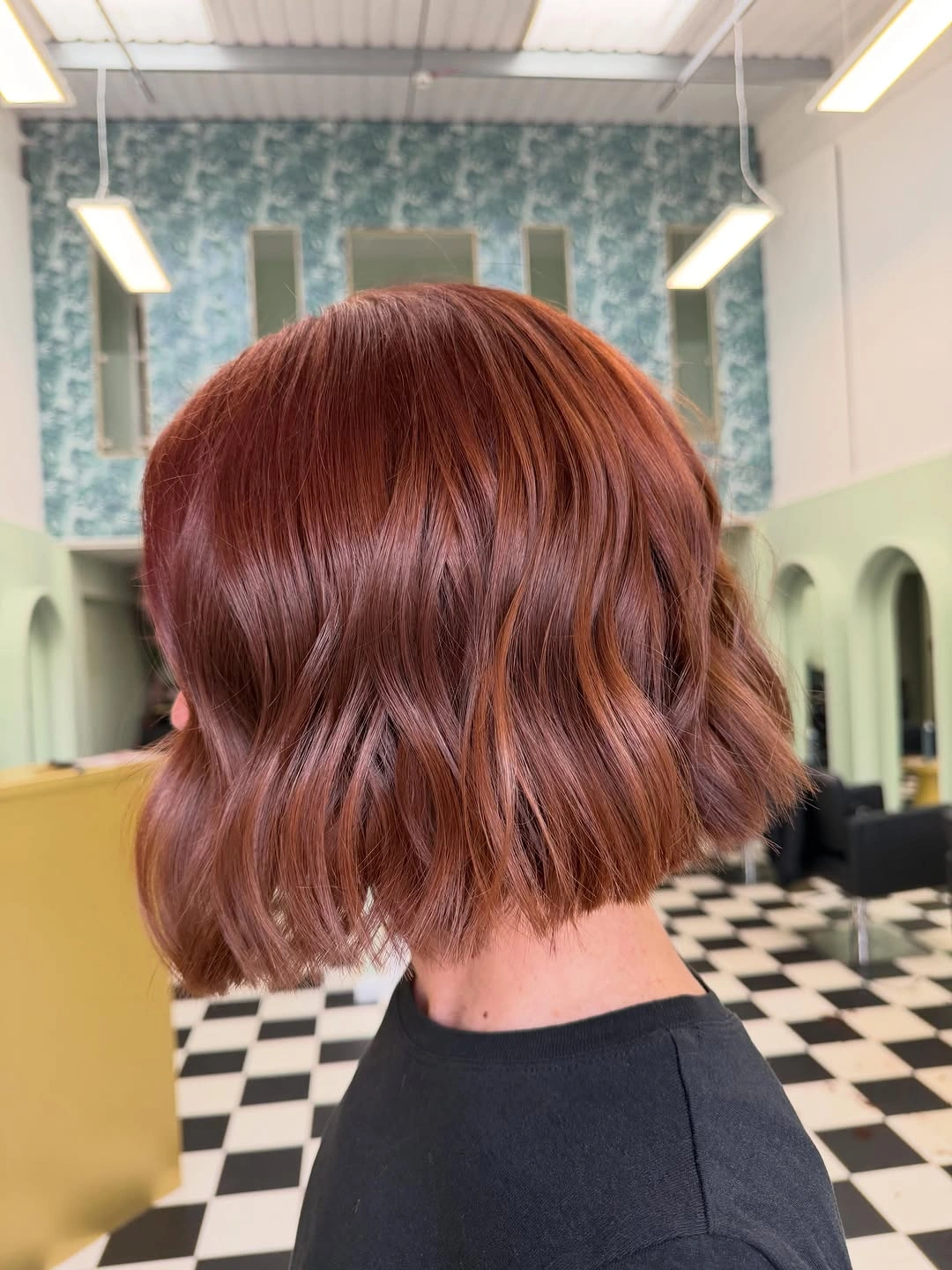 layered bob hair warm copper bob with loose texture