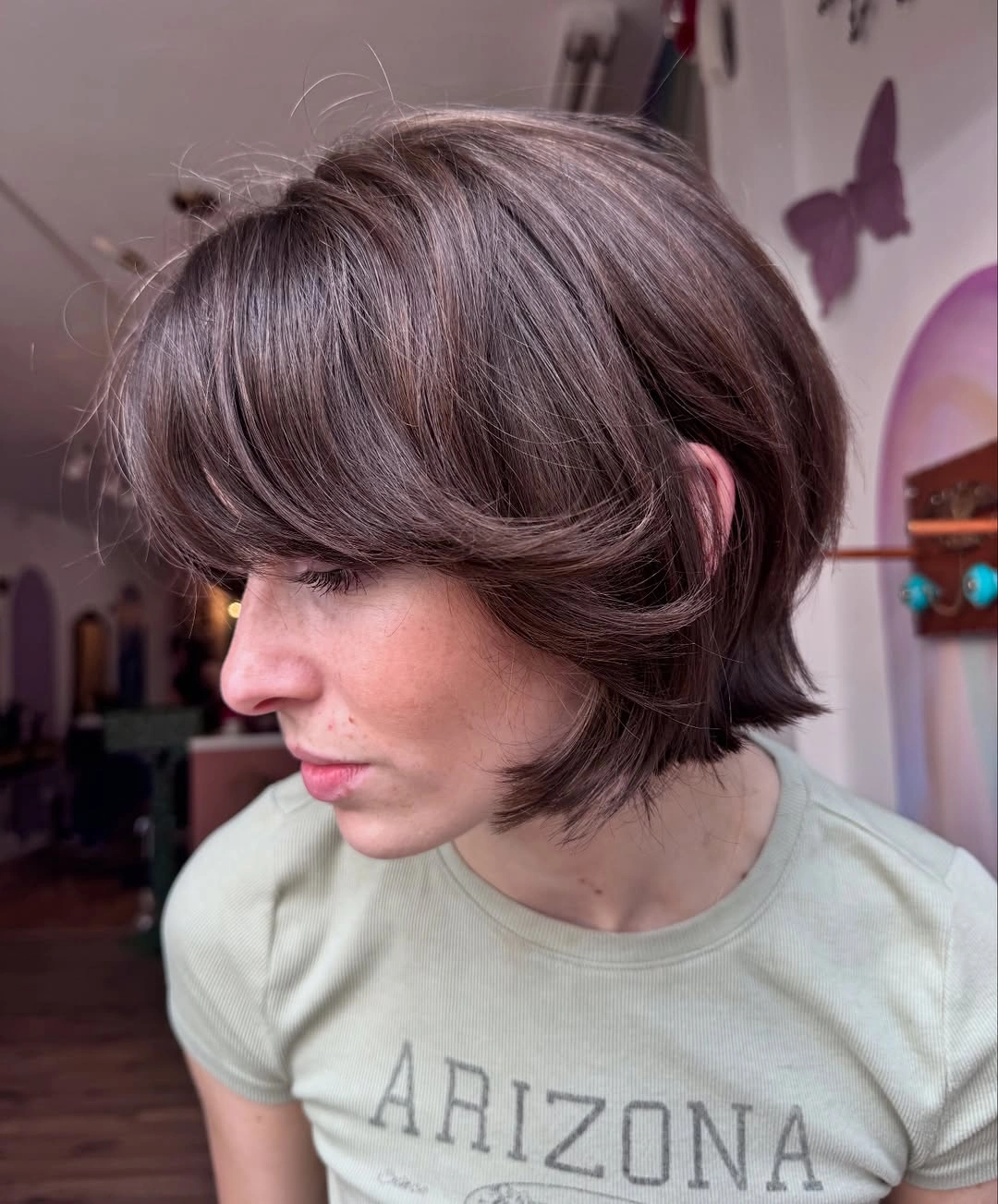 layered bob hair Short brunette bob with feathered movement