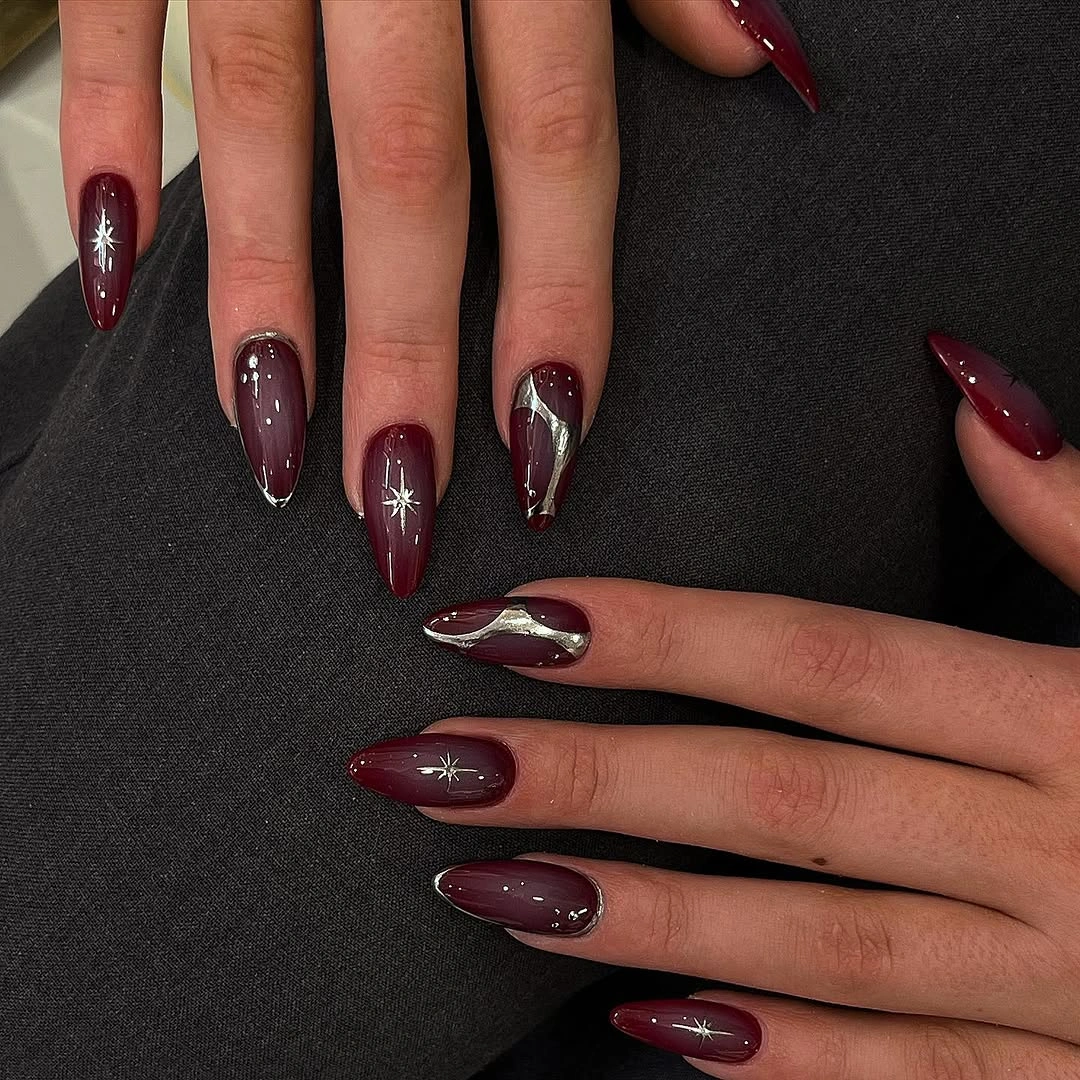 luxurious maroon fall nails 2026 Dark Burgundy With Liquid Silver Accents