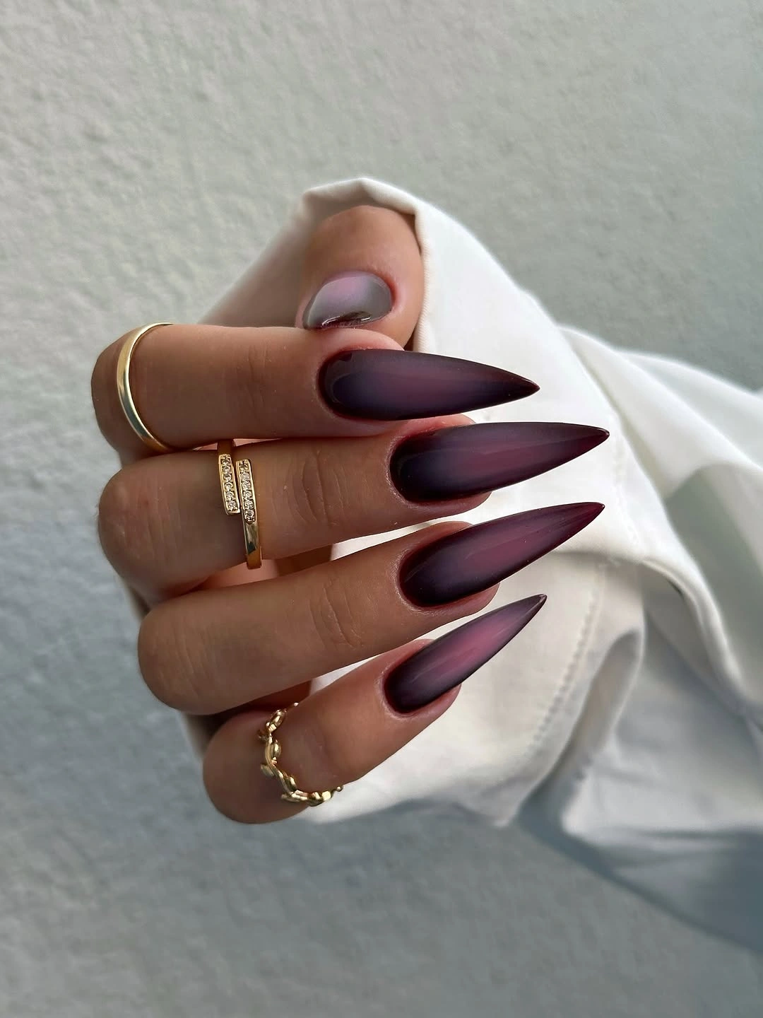 luxurious maroon fall nails 2026 Smoky Maroon Stiletto Nails