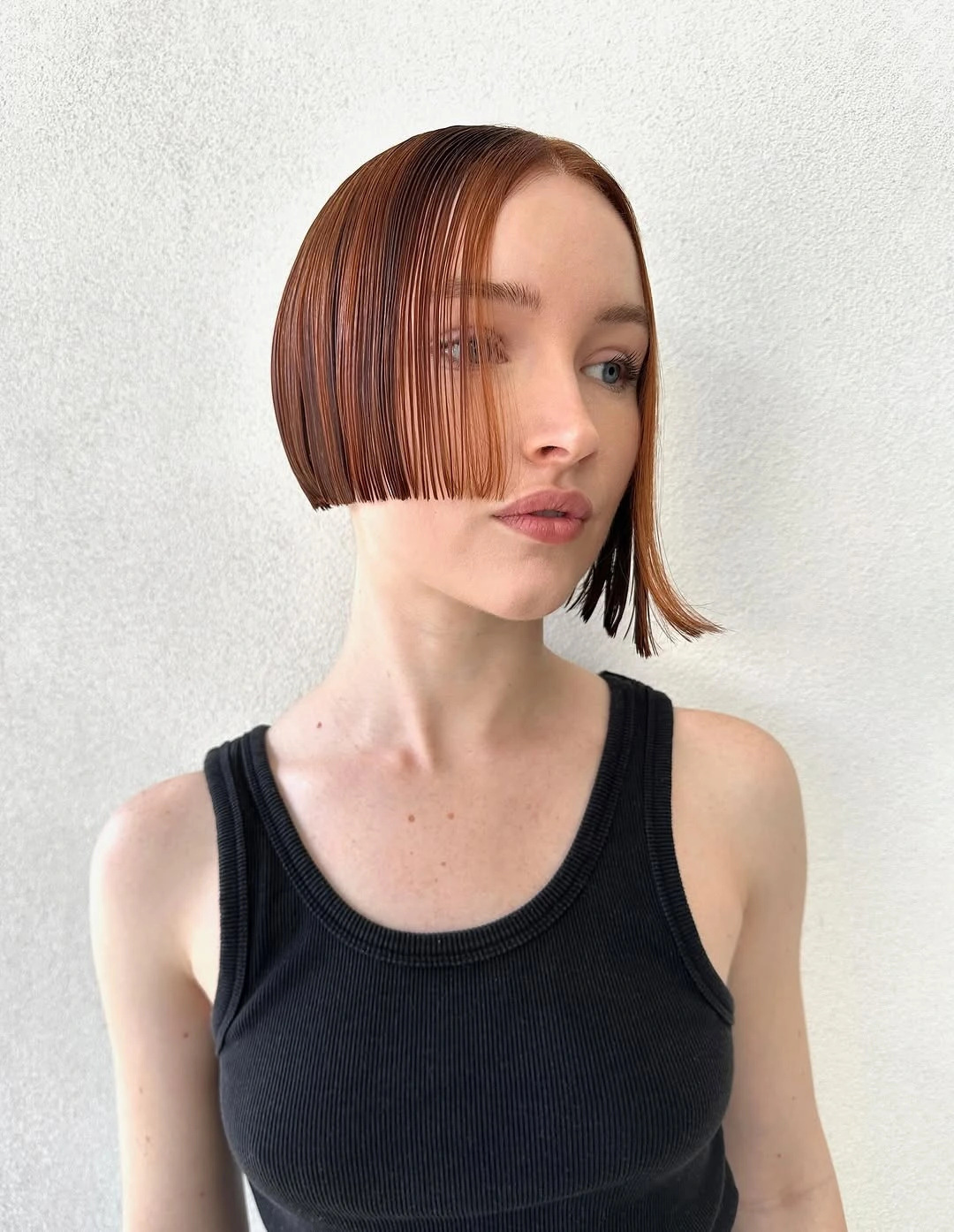 modern october haircut ideas 2026 Glossy Copper Precision Bob