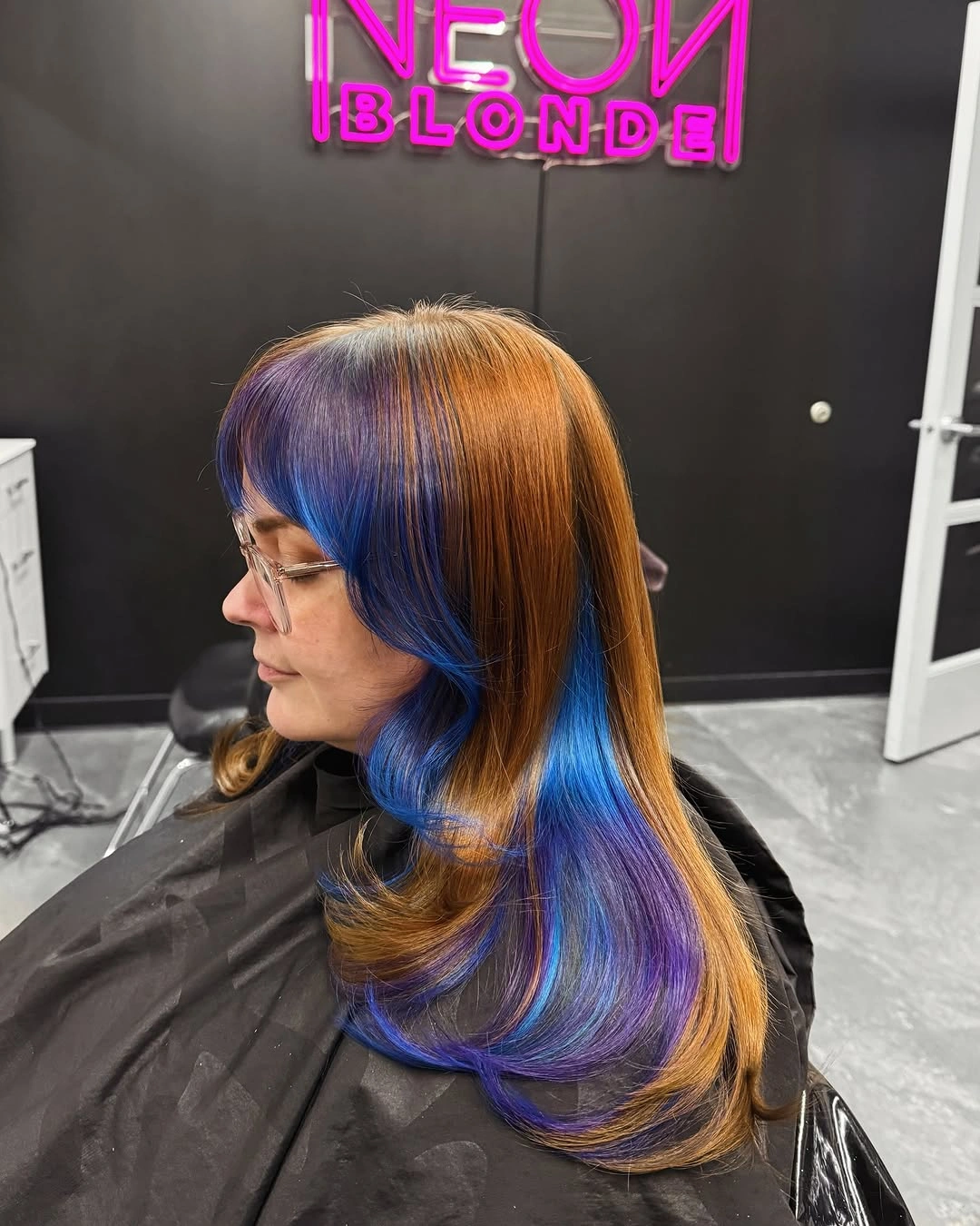 modern october haircut ideas 2026 Blue and Violet Color Melt With a Rounded Medium Cut