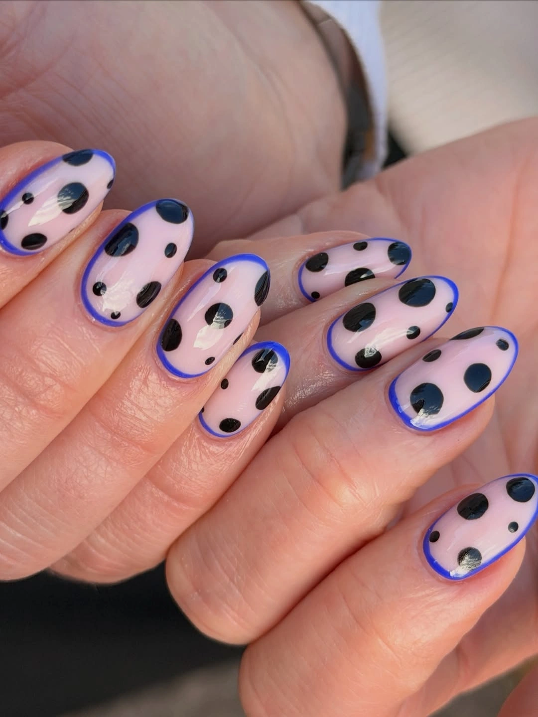 playful polka dot fall nails 2026 Blue Outline Nails With Oversized Black Polka Dots