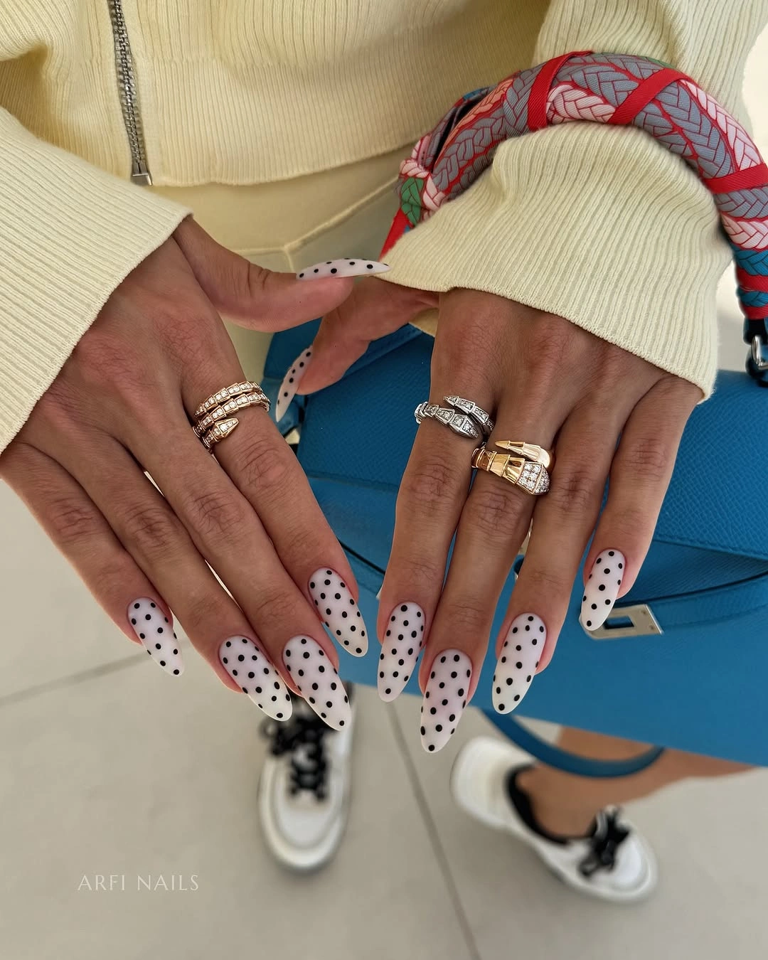 playful polka dot fall nails 2026 White Almond Polka Dot Nails With a Minimalist Finish