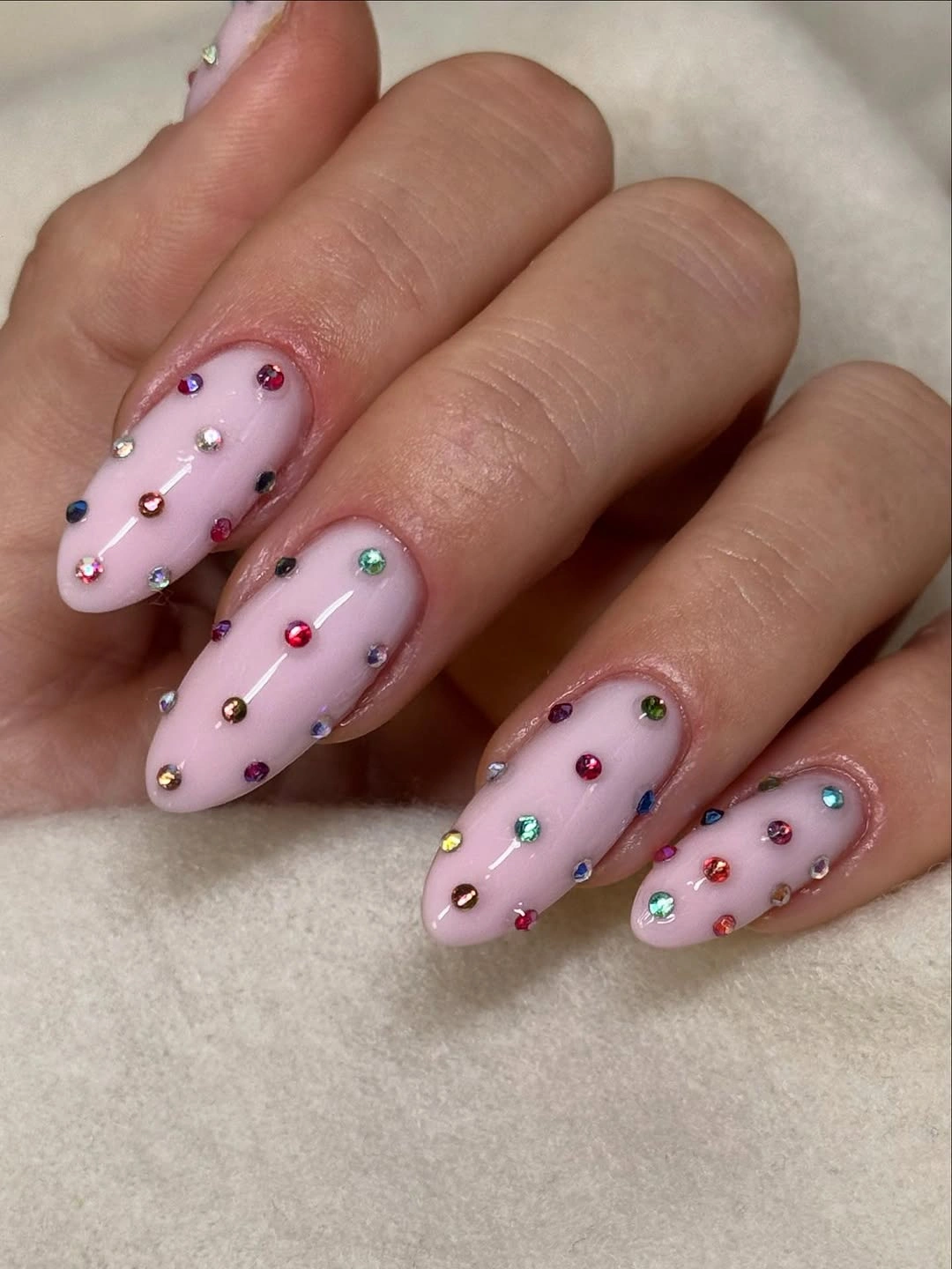 playful polka dot fall nails 2026 Pastel Pink Nails With Colorful Rhinestone Dots