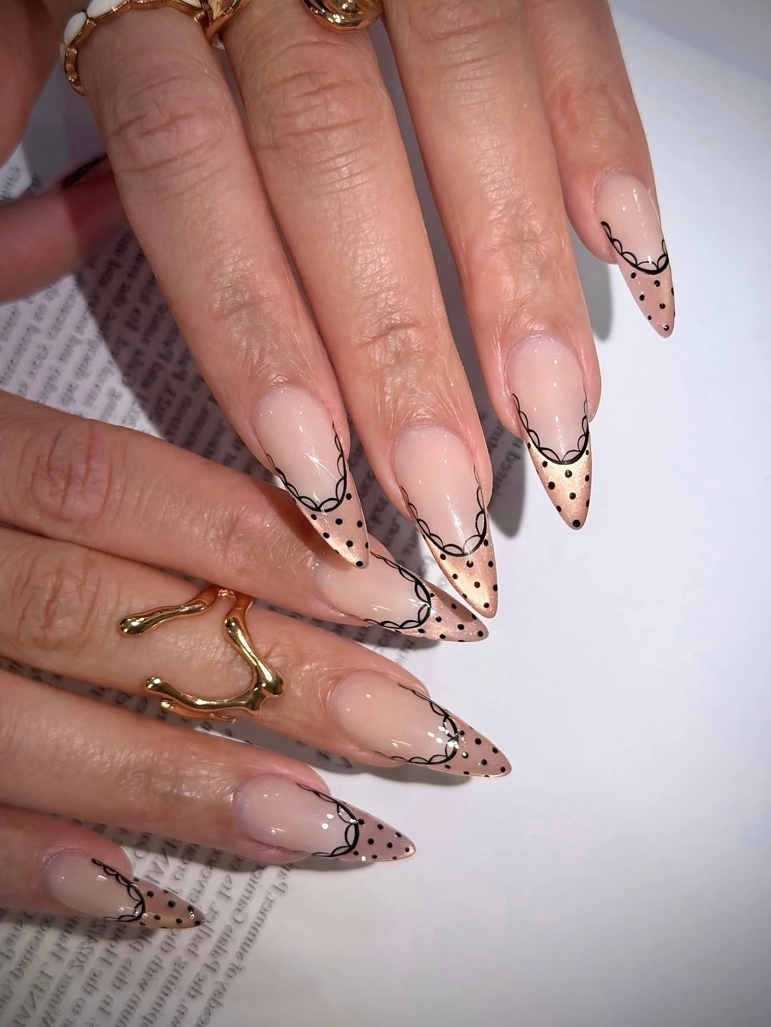 playful polka dot fall nails 2026 Sheer French Polka Dot Nails With Black Lace Details