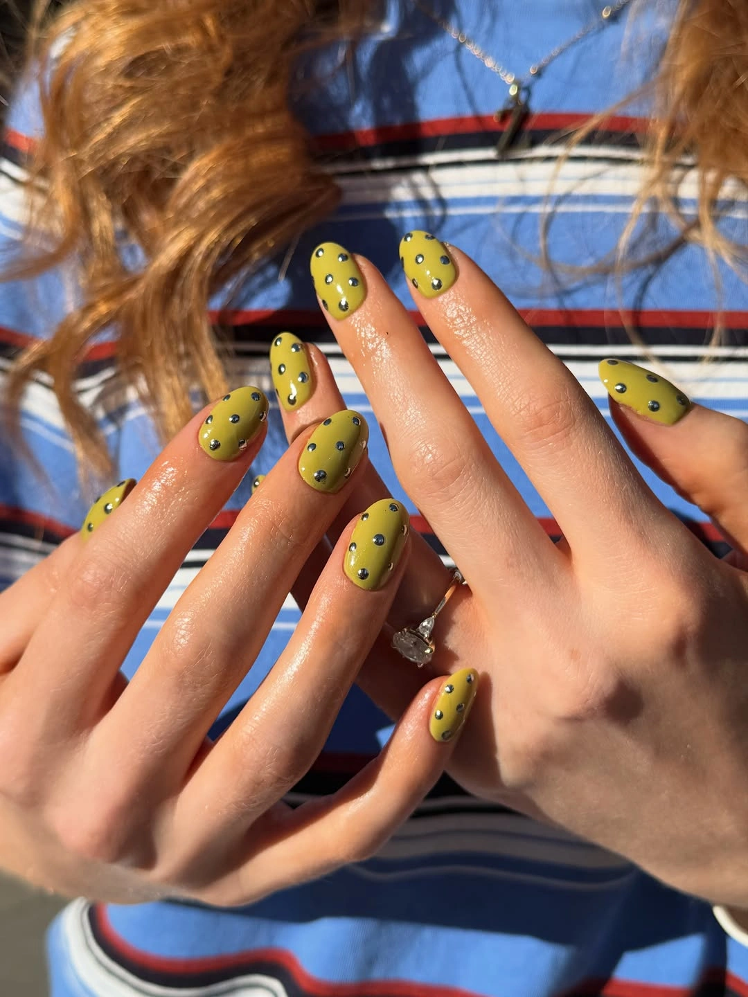 playful polka dot fall nails 2026 Olive Green Almond Nails With Metallic Polka Dot Details